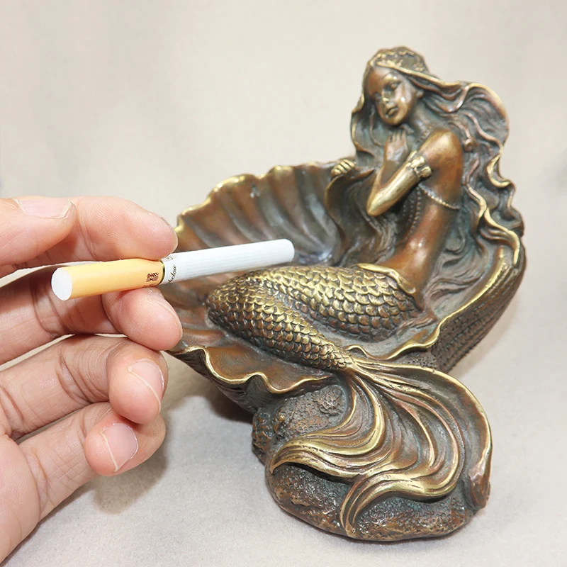 Antique Brass Beautiful Mermaid Statue Desktop Ornament Creative Ashtray Figurines Home Decoration Crafts Accessories Men Gifts
Antique Brass Beautiful Mermaid Statue Desktop Ornament Creative Ashtray Figurines Home Decoration Crafts Accessories Men Gifts