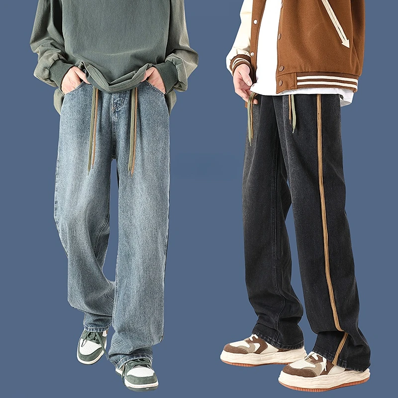 Мужские джинсы в полоску сбоку, Модные свободные джинсы со шнуровкой, в Корейском стиле, с широкими штанинами, черные/синие
Мужские джинсы в полоску сбоку, Модные свободные джинсы со шнуровкой, в Корейском стиле, с широкими штанинами, черные/синие