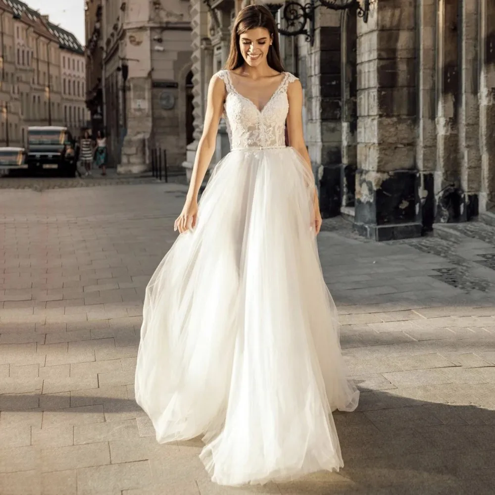 Elegant Wedding Dress A-Line Sheer Neck Cap Sleeve Chiffon Lace Applique Sequin Button Sweep Train Bridal Gown Vestidos De Noiva
Elegant Wedding Dress A-Line Sheer Neck Cap Sleeve Chiffon Lace Applique Sequin Button Sweep Train Bridal Gown Vestidos De Noiva