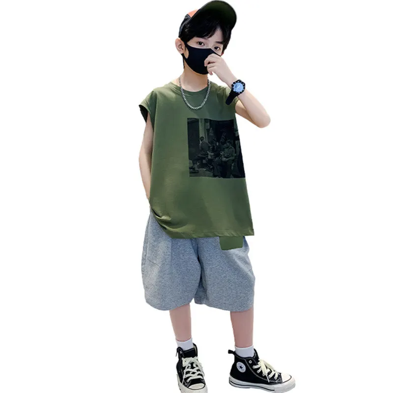 Children New Summer Middle School Cotton Boy Clothes Set Leisure Sleeveless Tshirt Top + Shorts Hot Sales Korean Outfits 5-14Age
Children New Summer Middle School Cotton Boy Clothes Set Leisure Sleeveless Tshirt Top + Shorts Hot Sales Korean Outfits 5-14Age