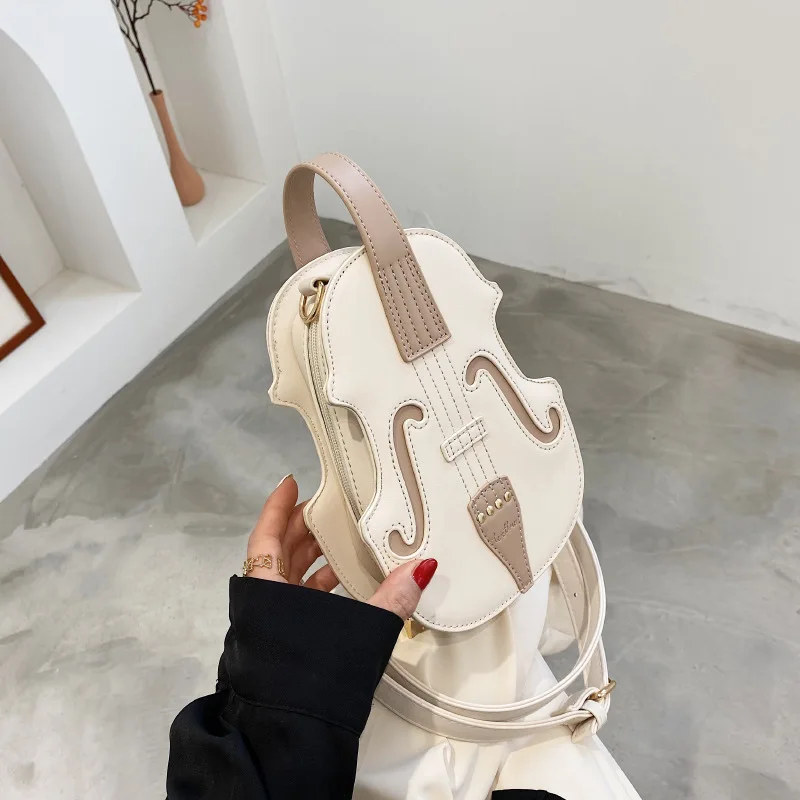 Interesting Brown Violin Shaped Shoulder Bag for Teenagers and Girl Fashionable Backpack for Travel Multi-purpose Pu Leather Bag
Interesting Brown Violin Shaped Shoulder Bag for Teenagers and Girl Fashionable Backpack for Travel Multi-purpose Pu Leather Bag