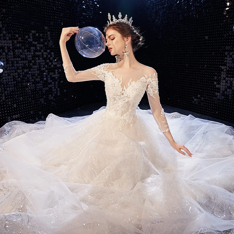 Ivory Long Sleeves Wedding Dresses Luxury Beaded Sequined Appliques Lace Shiny Glitter Champagne A-Line V-Neck Bride Gowns New
Ivory Long Sleeves Wedding Dresses Luxury Beaded Sequined Appliques Lace Shiny Glitter Champagne A-Line V-Neck Bride Gowns New