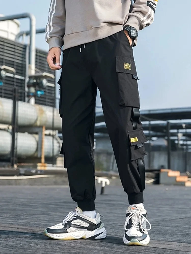 

Functional multi pocket workwear pants for men's winter plush ankle loose trendy men's pants, 9-point Harlan casual pants