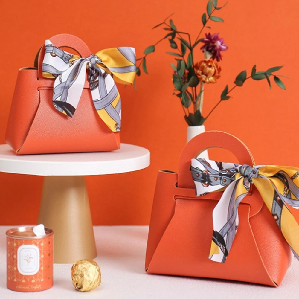 5/10PCS Leather Gift Bags Bow Ribbon Packaging Bag Wedding Favour Distributions Mubarak Candy Packaging Box Mini Handbag
5/10PCS Leather Gift Bags Bow Ribbon Packaging Bag Wedding Favour Distributions Mubarak Candy Packaging Box Mini Handbag