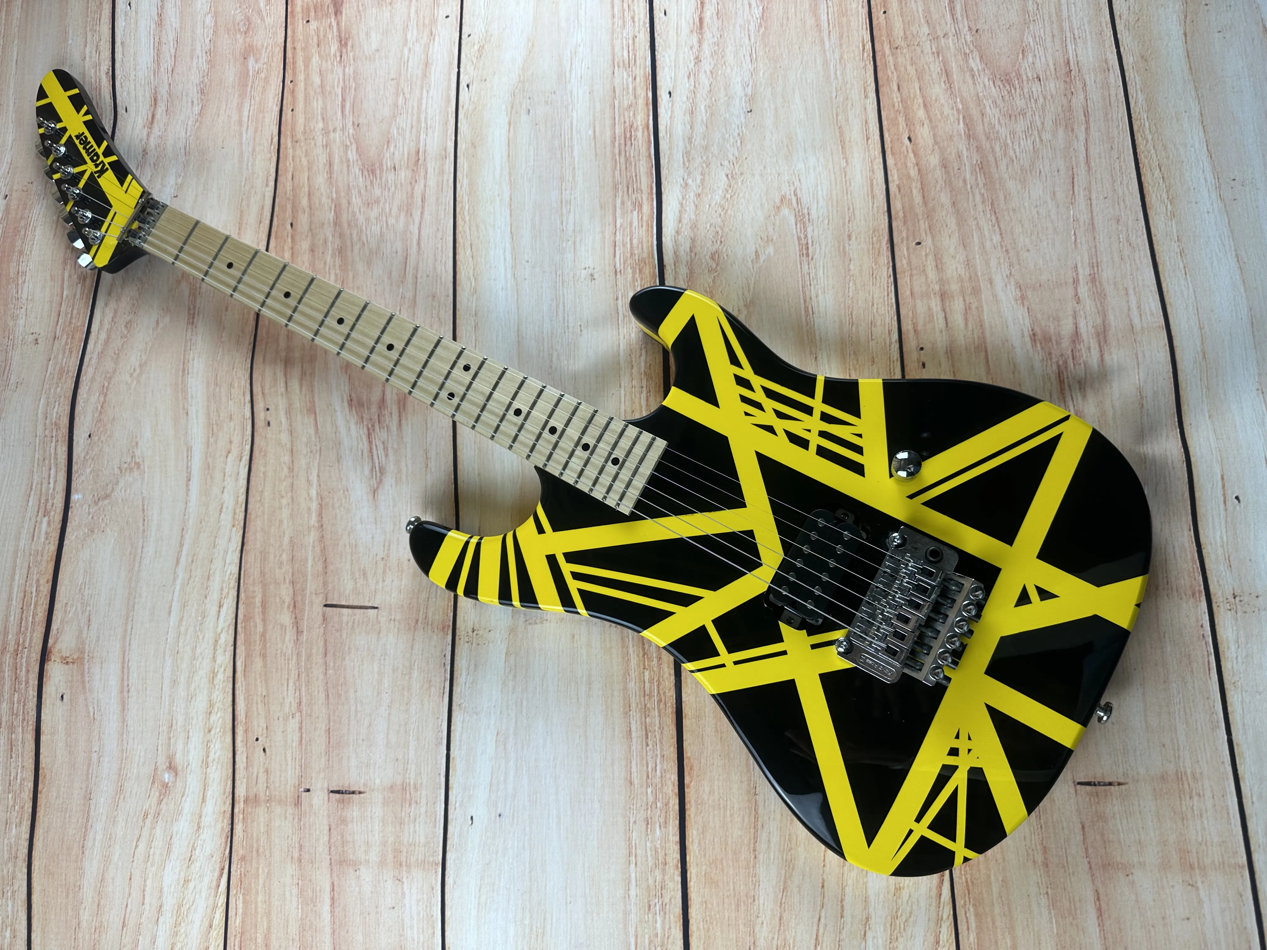 

5150 electric guitar, imported alder body, Canadian maple fingerboard, signed, classic yello and white stripes, lightning packag