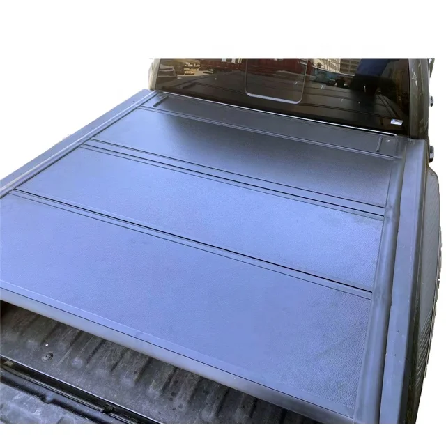 Tuck Pickups Tacoma Hilux Triton L200 Range r Dmax Navara Colorado Bakflip Tonneau Cover Low Profile Truck Bed Hard Fold
Tuck Pickups Tacoma Hilux Triton L200 Range r Dmax Navara Colorado Bakflip Tonneau Cover Low Profile Truck Bed Hard Fold