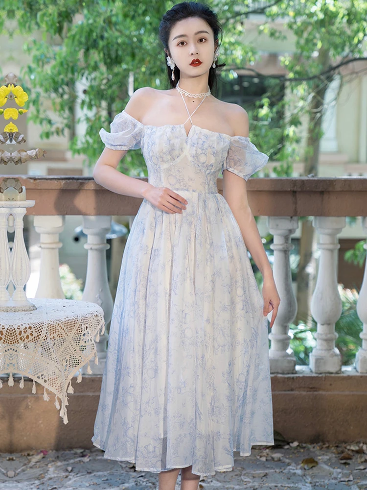 Summer new women's Bohemian travel vacation beach wind hanging neck type one word collar print elegant luxury chiffon dress
Summer new women's Bohemian travel vacation beach wind hanging neck type one word collar print elegant luxury chiffon dress