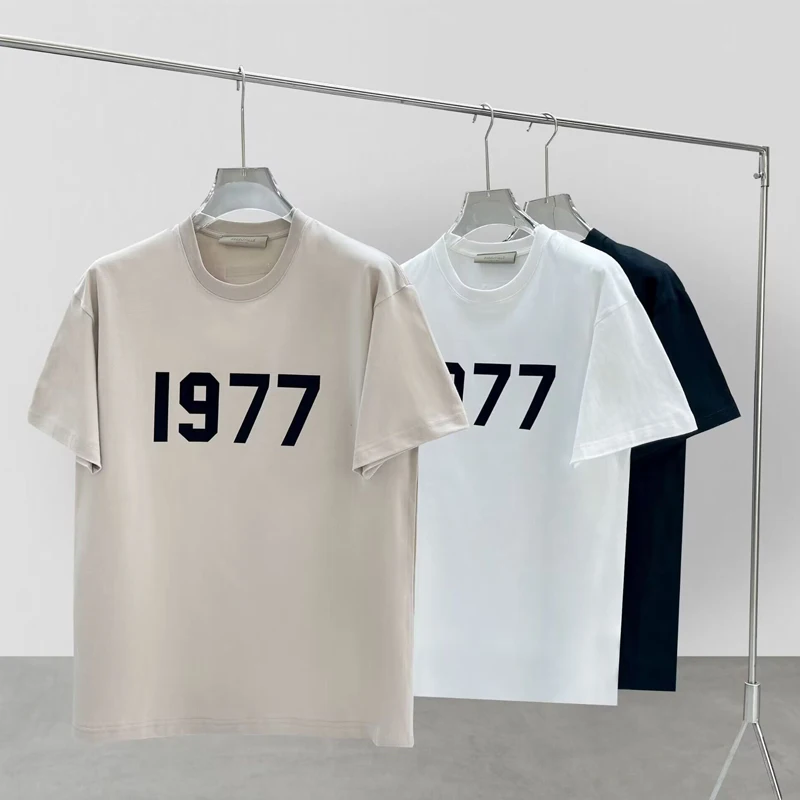 

Summer Fashion ESSENTIALS New T-Shirt Number 1977 Short Sleeve Unisex Loose High Street TRIP Men and Women Brand Chest