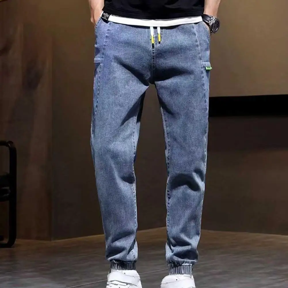 Men Harem Pants Solid Color Elastic Waist Drawstring Men Jeans Multi Pockets Ankle-banded Cargo Pants Loose Ankle Length Trouser
Men Harem Pants Solid Color Elastic Waist Drawstring Men Jeans Multi Pockets Ankle-banded Cargo Pants Loose Ankle Length Trouser