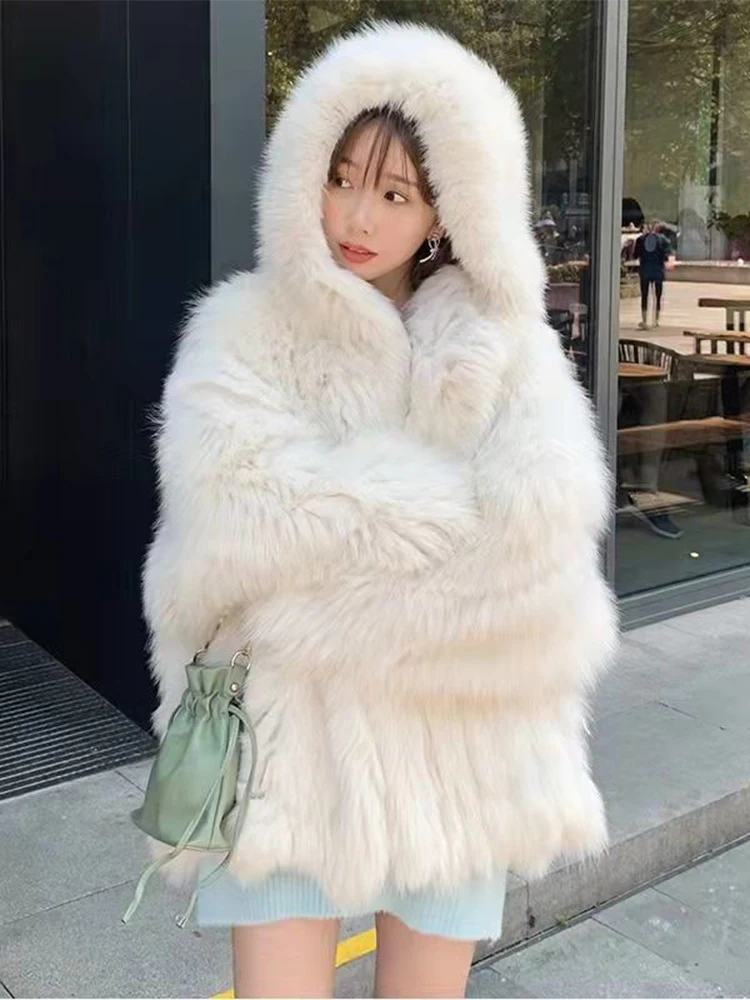 2023 Winter Shaggy Hairy Thick Warm Soft Faux Fur Jacket Women with Hooded Long Sleeve Loose Causal Fur Coat Designer Clothes
2023 Winter Shaggy Hairy Thick Warm Soft Faux Fur Jacket Women with Hooded Long Sleeve Loose Causal Fur Coat Designer Clothes