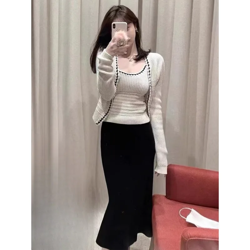 Women's Suit New Hook Flower V-neck Single Breasted Knitted Cardigan+Tank Top+Wrapped Hip Fishtail Skirt Simple Sexy Three Piece
Women's Suit New Hook Flower V-neck Single Breasted Knitted Cardigan+Tank Top+Wrapped Hip Fishtail Skirt Simple Sexy Three Piece