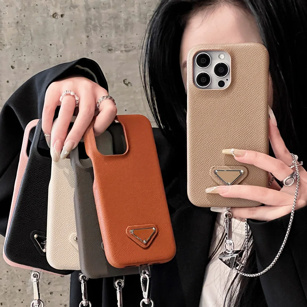 Luxury Wrist strap Metal hook Case for iPhone 15 14 13 Pro 12 Pro Max Cases Cover Logo Shockproof Coque Leather Protector Funda
Luxury Wrist strap Metal hook Case for iPhone 15 14 13 Pro 12 Pro Max Cases Cover Logo Shockproof Coque Leather Protector Funda