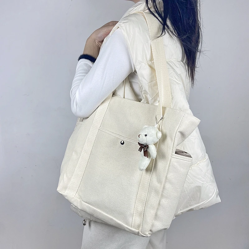 Fashionable Minimalist Canvas Tote Bag With Niche Design Versatile Single Shoulder Bag Casual High-capacity Commuting Handbag
Fashionable Minimalist Canvas Tote Bag With Niche Design Versatile Single Shoulder Bag Casual High-capacity Commuting Handbag