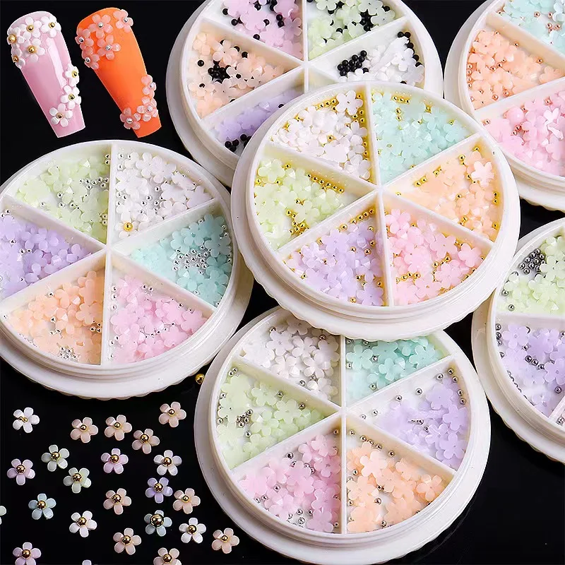 High Quality Glitter Wholesale Nail Jewelry Art Colors Flower Shape with Steel Ball Beads Nail Charm Decoration Mixed Colors
High Quality Glitter Wholesale Nail Jewelry Art Colors Flower Shape with Steel Ball Beads Nail Charm Decoration Mixed Colors