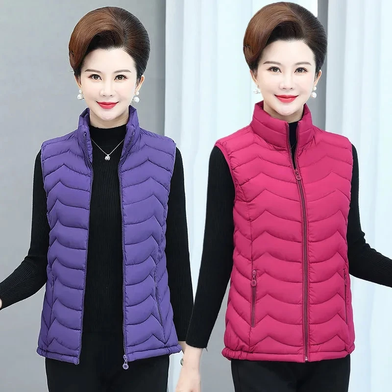 Autumn Winter Woman Jacket Vest New Stand Collar Down Cotton-Padded Vest Sleeveless Short Coat Mujer 6XL Female Waistcoat
Autumn Winter Woman Jacket Vest New Stand Collar Down Cotton-Padded Vest Sleeveless Short Coat Mujer 6XL Female Waistcoat