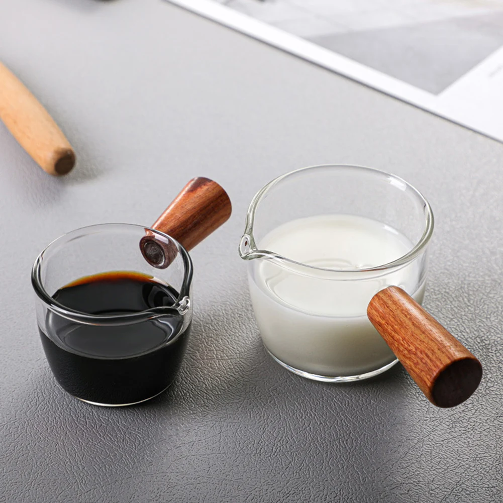 50ml/80ml Glass Milk Cup Creamer Jug Small Glass Coffee Milk Pitcher Espresso Cup Vinegar Sauce Cup Glass Gravy Boat Wood Handle
50ml/80ml Glass Milk Cup Creamer Jug Small Glass Coffee Milk Pitcher Espresso Cup Vinegar Sauce Cup Glass Gravy Boat Wood Handle