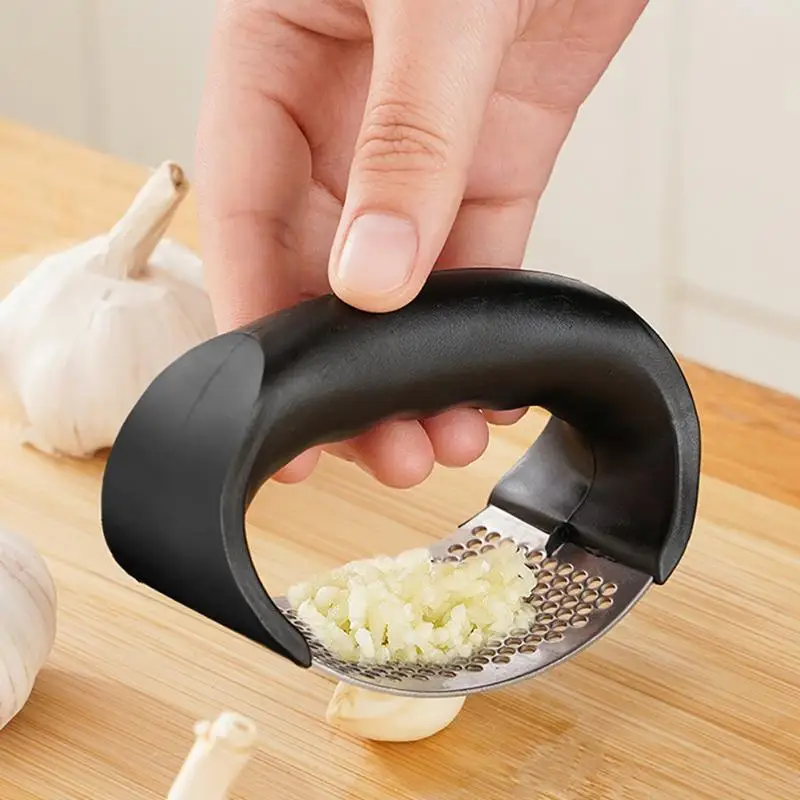 

Kitchen Multi-function Grinding Slicer SO-shaped Garlic Ginger Press Hand Held Kitchen Rolling Crusher Vegetable Tool