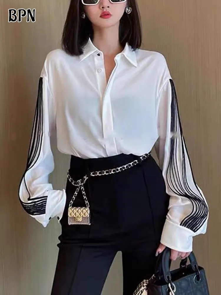 BPN Temperament Striped Shirts For Women Lapel Lantern Sleeve Hit Color Casual Loose Korean Blouses Female Fashion Clothing New
BPN Temperament Striped Shirts For Women Lapel Lantern Sleeve Hit Color Casual Loose Korean Blouses Female Fashion Clothing New
