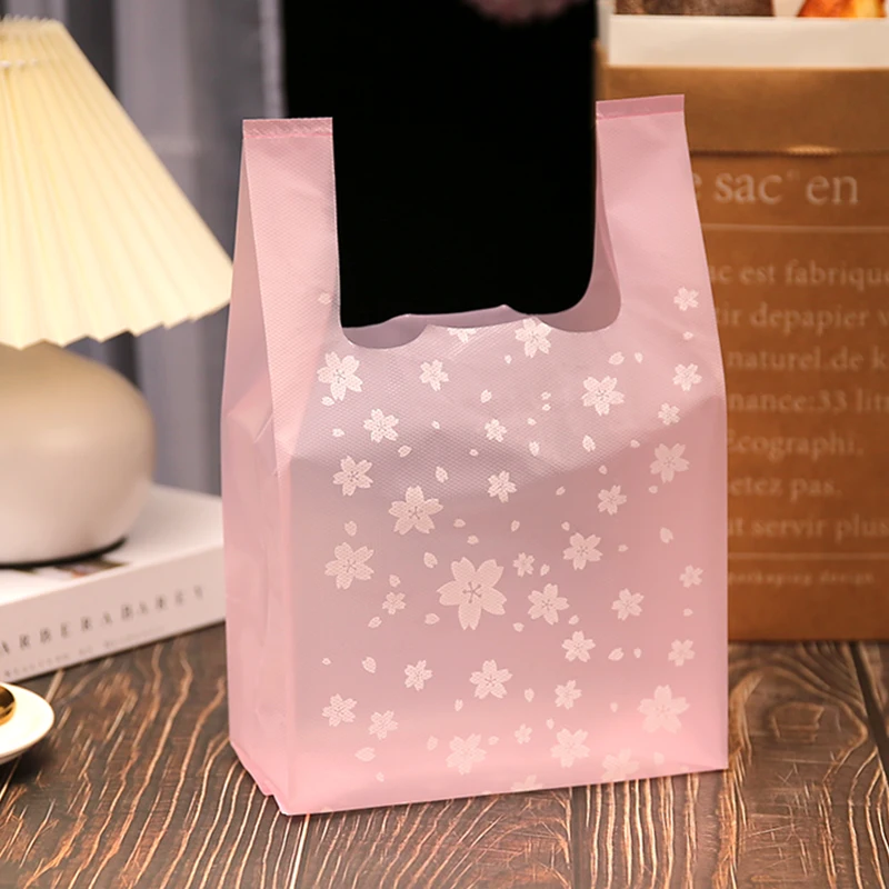 100Pcs Supermarket Plastic Bags With Handle Useful Plastic Storage Bag Vest Shopping Bag Cake Food Packaging
100Pcs Supermarket Plastic Bags With Handle Useful Plastic Storage Bag Vest Shopping Bag Cake Food Packaging
