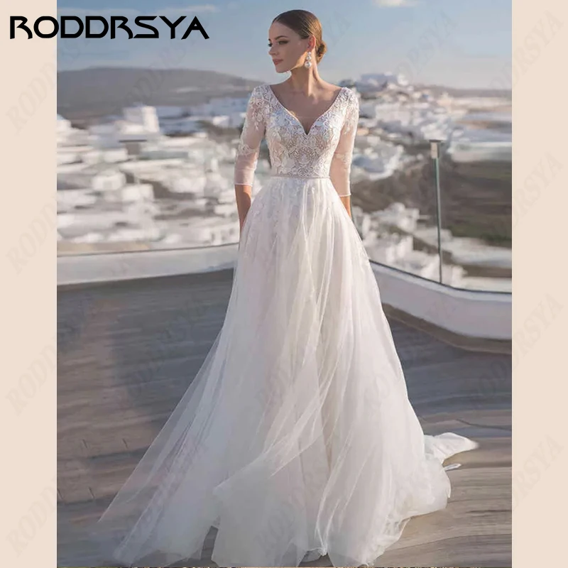 RODDRAYA V-Neck Backless Wedding Dresses A-line Tulle Bride Party 3/4 Sleeves Lace Appliques Vestido De Noiva Beach Bridal Gowns
RODDRAYA V-Neck Backless Wedding Dresses A-line Tulle Bride Party 3/4 Sleeves Lace Appliques Vestido De Noiva Beach Bridal Gowns