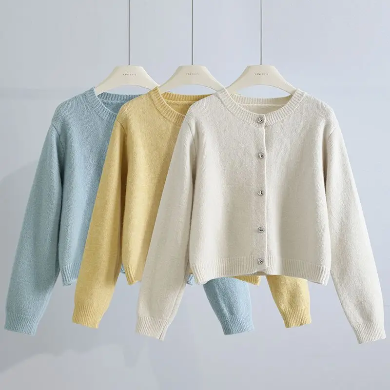 2023 Women's Early Autumn New Short Round Neck Cardigan Female Solid Color Knitted Coats Ladies Loose Sweater Jackets T388
2023 Women's Early Autumn New Short Round Neck Cardigan Female Solid Color Knitted Coats Ladies Loose Sweater Jackets T388