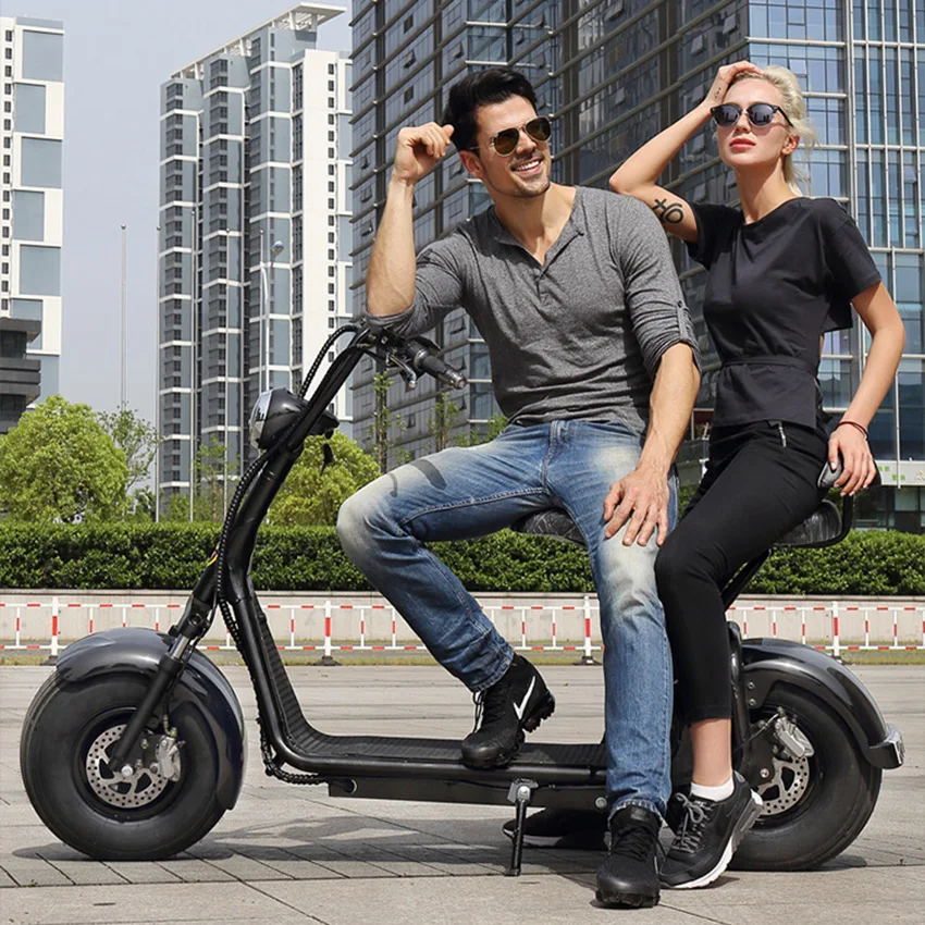 Electric Motorcycle Citycoco Max Speed 53KM/H 3000W Powerful Motor 60V20AH 18 Inch Fat Tire Two Wheel Adult Electric Scooter 
Electric Motorcycle Citycoco Max Speed 53KM/H 3000W Powerful Motor 60V20AH 18 Inch Fat Tire Two Wheel Adult Electric Scooter