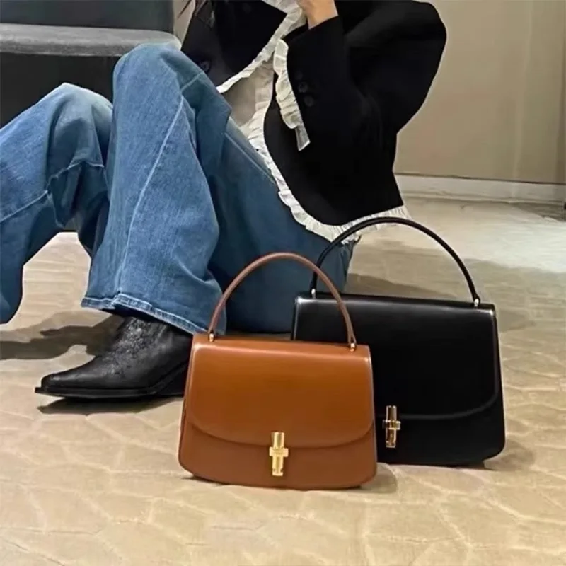 

The * T-shaped Lock Saddle Bag Women's Premium Cowhide Handbag Row Sofia Handbag Retro BOX Tofu Bag