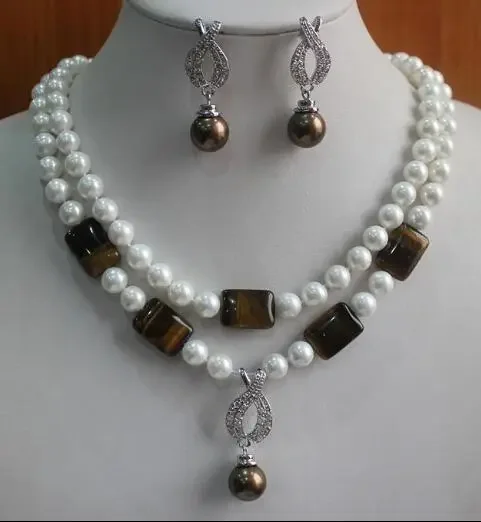 Бесплатная доставка 2 ряда горячие ювелирные изделия 7-8 мм Жемчужный Розовый нефритовый глаз кулон ожерелье серьги набор
Бесплатная доставка 2 ряда горячие ювелирные изделия 7-8 мм Жемчужный Розовый нефритовый глаз кулон ожерелье серьги набор