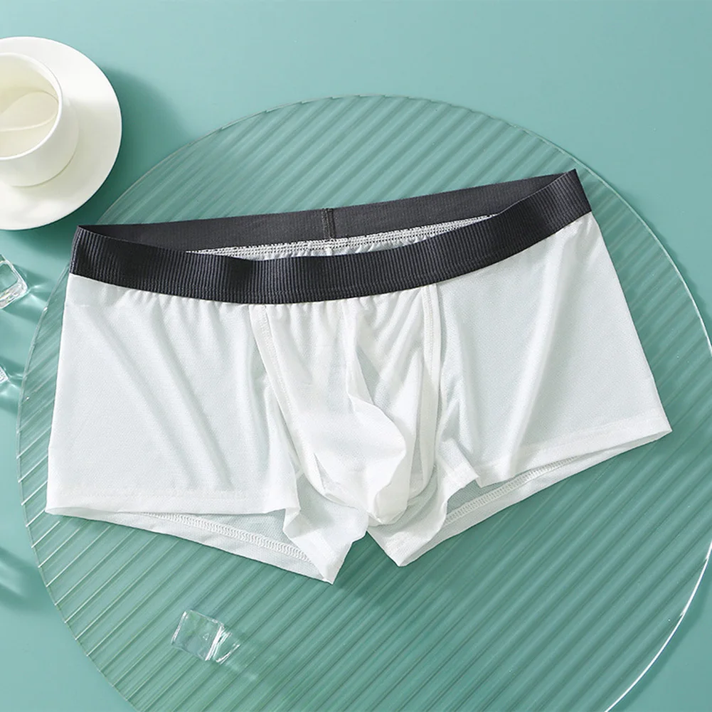 Sexy Mens Trunks Ice Silk Breathable Boxers Comfy Soft Seamless Underwear Bulge Pouch Boxer Briefs Wet Seductive Shorts Panties
Sexy Mens Trunks Ice Silk Breathable Boxers Comfy Soft Seamless Underwear Bulge Pouch Boxer Briefs Wet Seductive Shorts Panties