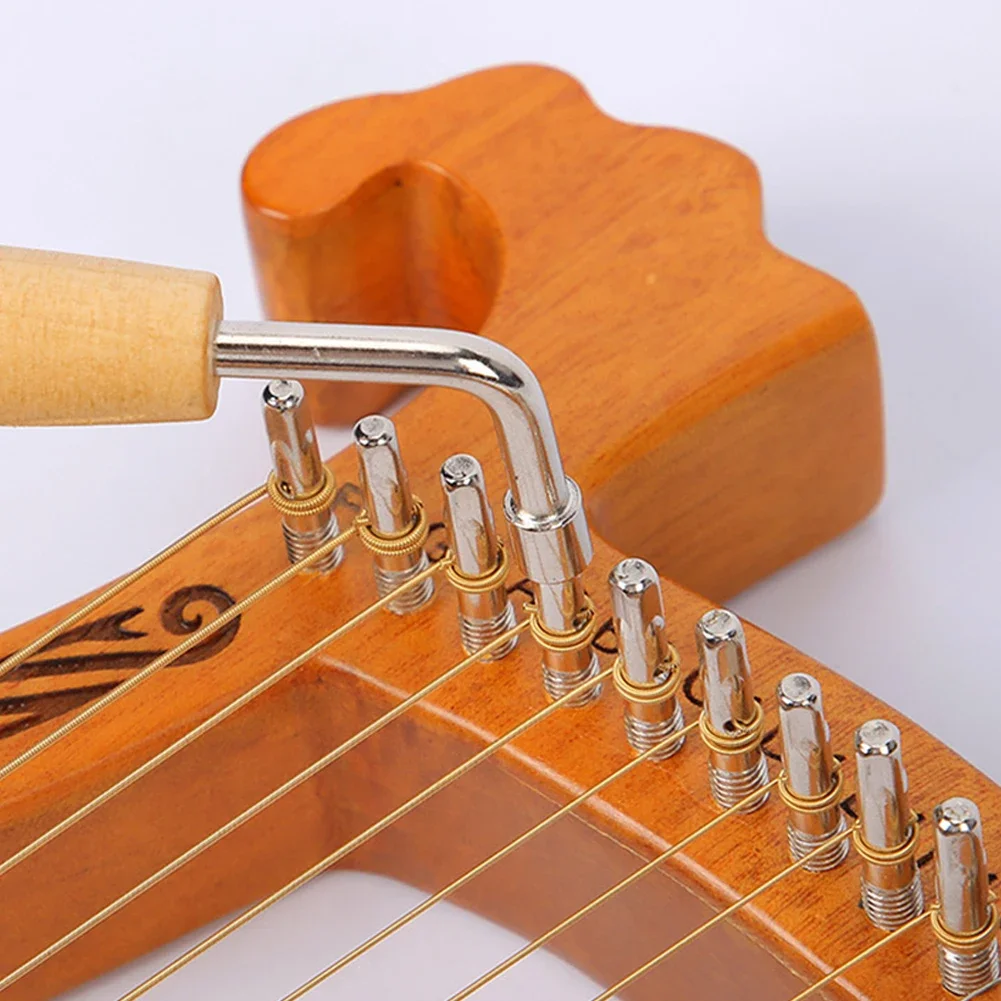 Wooden Handle Lyre Harp Tuning Wrench, Tuner Lever Adjustment Tool For Lasting Use, Silver + Yellow, 105x40x20mm
Wooden Handle Lyre Harp Tuning Wrench, Tuner Lever Adjustment Tool For Lasting Use, Silver + Yellow, 105x40x20mm