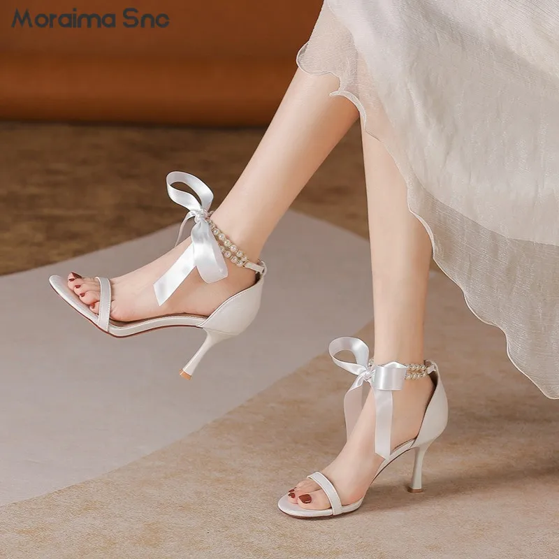 White Ribbon Strap Pearl Sandals Round Toe Strap Open Toe Stiletto Sandals Temperament Fashionable and Comfortable Women's Shoes
White Ribbon Strap Pearl Sandals Round Toe Strap Open Toe Stiletto Sandals Temperament Fashionable and Comfortable Women's Shoes