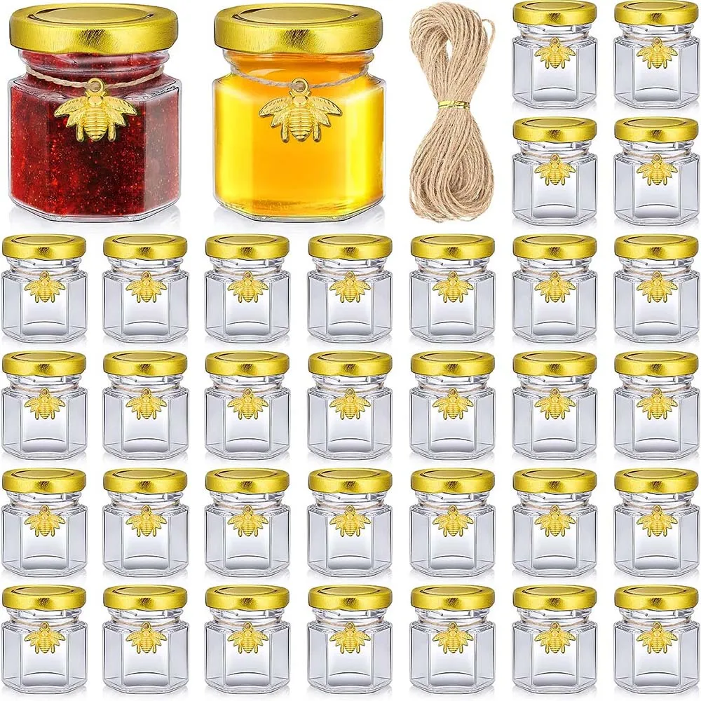 Mini Glass Jars Hexagon Honey Jar Golden Bee Pendants Canning Mason for Jam Honey, Baby Shower, Wedding Favors, Party Gifts
Mini Glass Jars Hexagon Honey Jar Golden Bee Pendants Canning Mason for Jam Honey, Baby Shower, Wedding Favors, Party Gifts