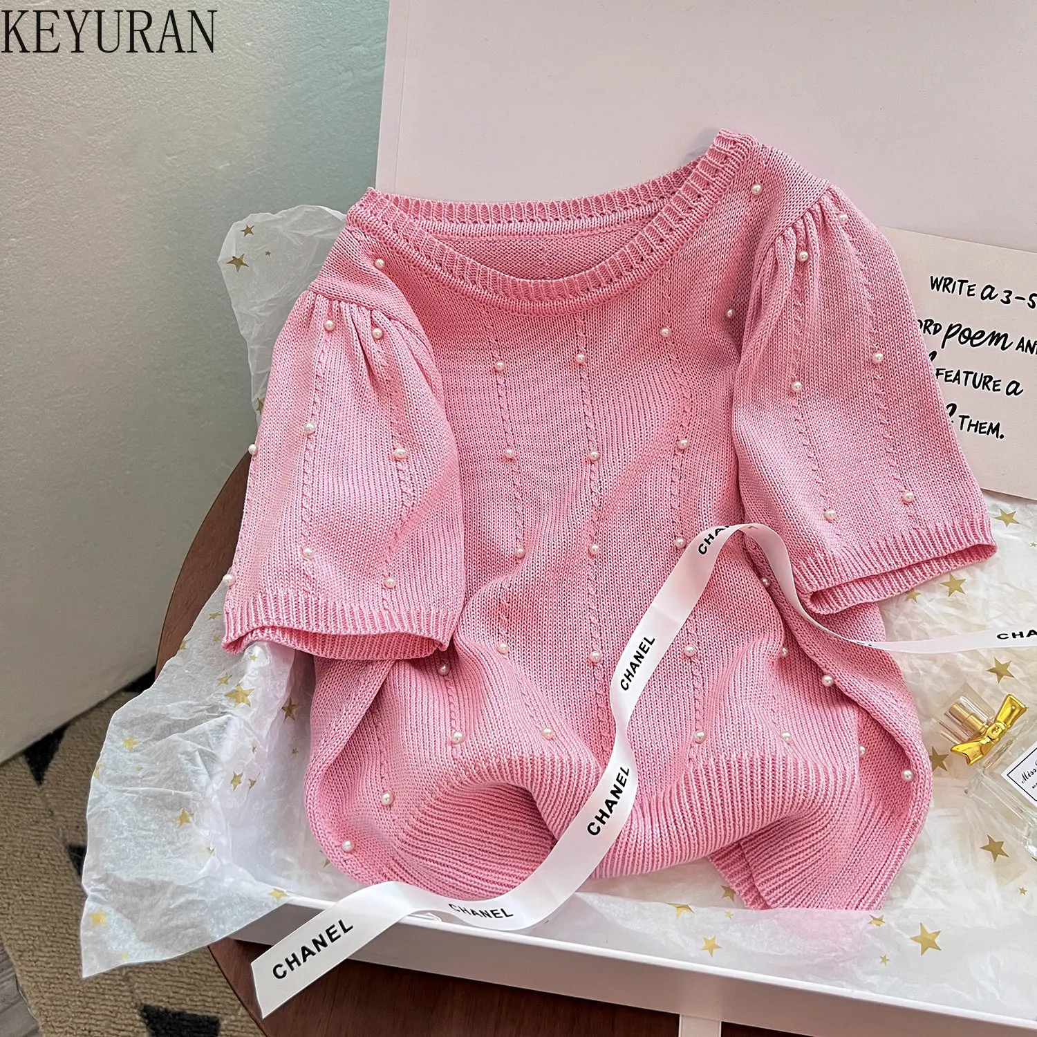 2023 Summer New Puff Sleeve Sweater Women Knitted T-Shirts Fashion Peals Beading O-Neck Thin Ice Silk Short Sleeve Knitwear Tops
2023 Summer New Puff Sleeve Sweater Women Knitted T-Shirts Fashion Peals Beading O-Neck Thin Ice Silk Short Sleeve Knitwear Tops