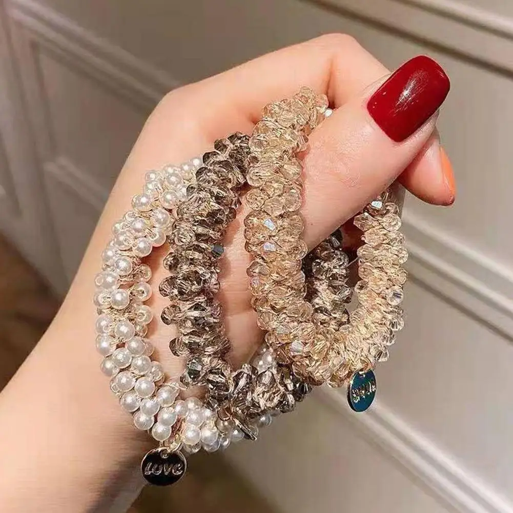 2023new Elegent Crystal Beads Hair Rope Bands Women Head Bracelet Hair Rhinestone Rope Band Elastic Accessories Scrunchies Q5I2
2023new Elegent Crystal Beads Hair Rope Bands Women Head Bracelet Hair Rhinestone Rope Band Elastic Accessories Scrunchies Q5I2