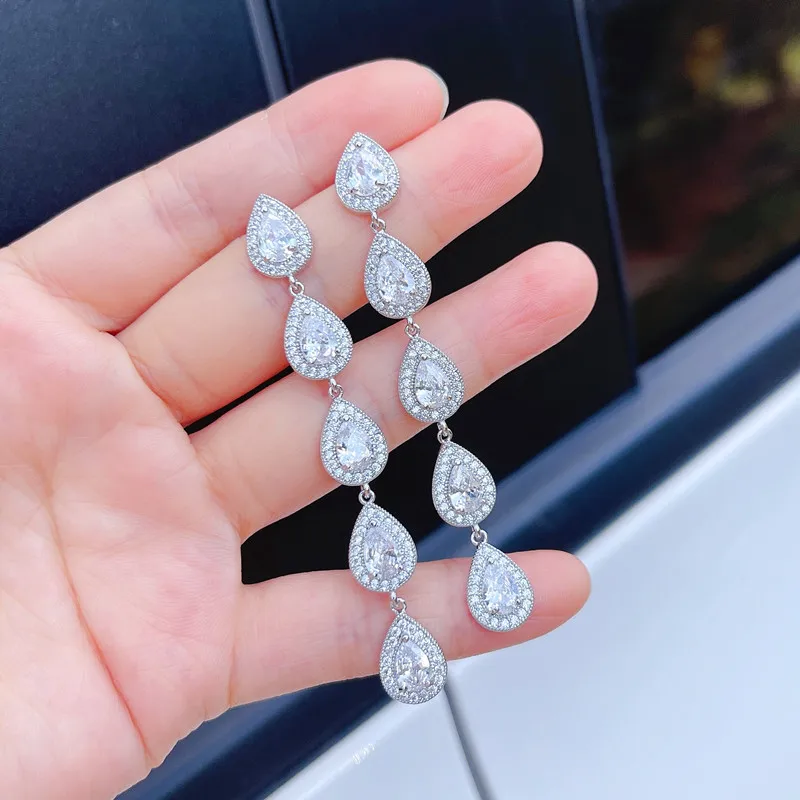 Elegant Fashion AAA+ Cubic Zirconia Water Drop Long Big Crystal Bridal Dangle Drop Earring for Women Party Prom Wedding Jewelry
Elegant Fashion AAA+ Cubic Zirconia Water Drop Long Big Crystal Bridal Dangle Drop Earring for Women Party Prom Wedding Jewelry