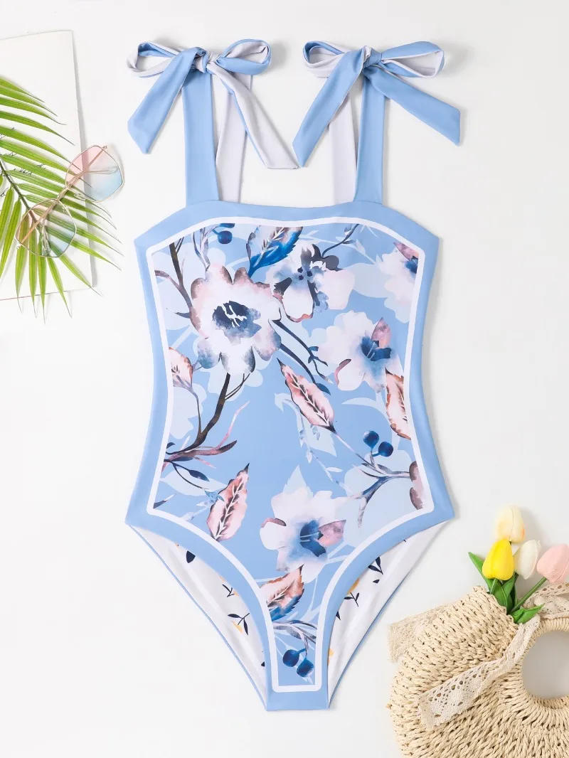 Женский слитный купальник с цветочным принтом и бантом
Женский слитный купальник с цветочным принтом и бантом