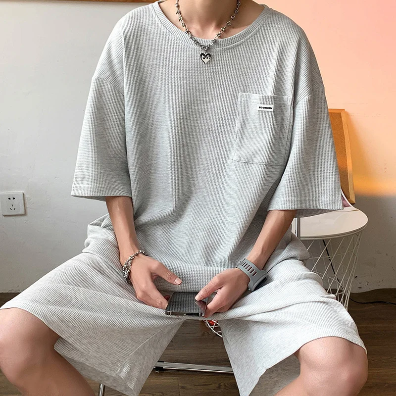 Summer Sports Men's Loose Short Sleeve And Shorts Two Piece Set Men Waffle Korean Fashion Tracksuits Luxury Clothing
Summer Sports Men's Loose Short Sleeve And Shorts Two Piece Set Men Waffle Korean Fashion Tracksuits Luxury Clothing