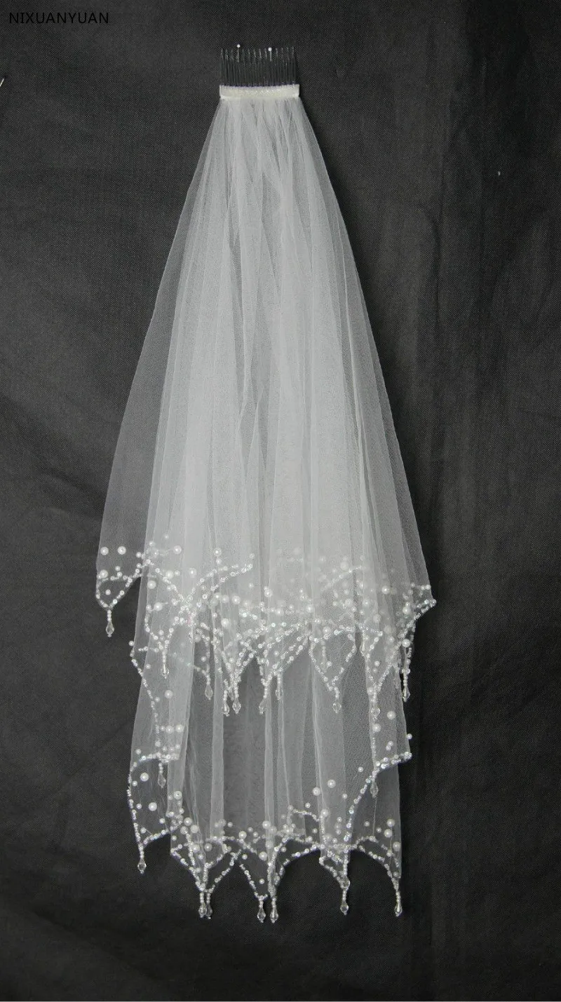 Clear Drop Beaded Cheap Bridal Wedding Veil in Stock 2T Hand Sew Crystal Edge with Comb
Clear Drop Beaded Cheap Bridal Wedding Veil in Stock 2T Hand Sew Crystal Edge with Comb