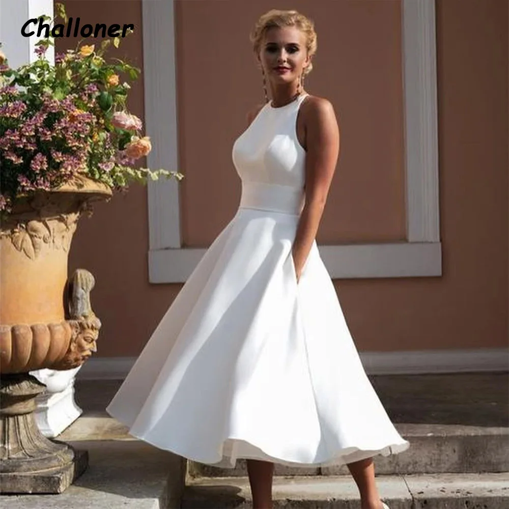 Challoner O-Neck Short Wedding Dress Sleeveless Applique Backless Tea Length Bridal Gown Pockets Custom Made Vestidos De Novia
Challoner O-Neck Short Wedding Dress Sleeveless Applique Backless Tea Length Bridal Gown Pockets Custom Made Vestidos De Novia