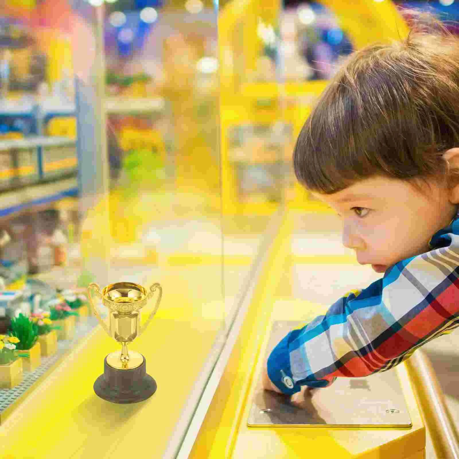 Golden Mini Award Trophy Plastic Reward Prizes Kindergarten Kids Gift Awards Games Reward Props Party Gifts Toy Decor
Golden Mini Award Trophy Plastic Reward Prizes Kindergarten Kids Gift Awards Games Reward Props Party Gifts Toy Decor