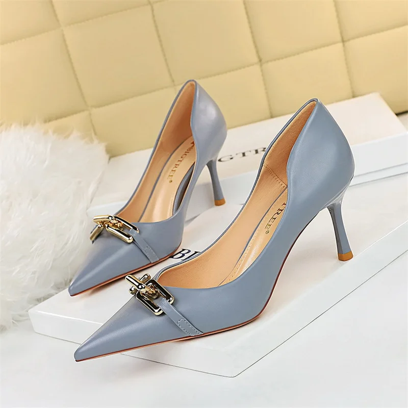 

Elegant Women Shallow Mouth Pumps Metal Button Thin Heel Single Shoes Stiletto Banquet Pointed Toe Hollow High Heel