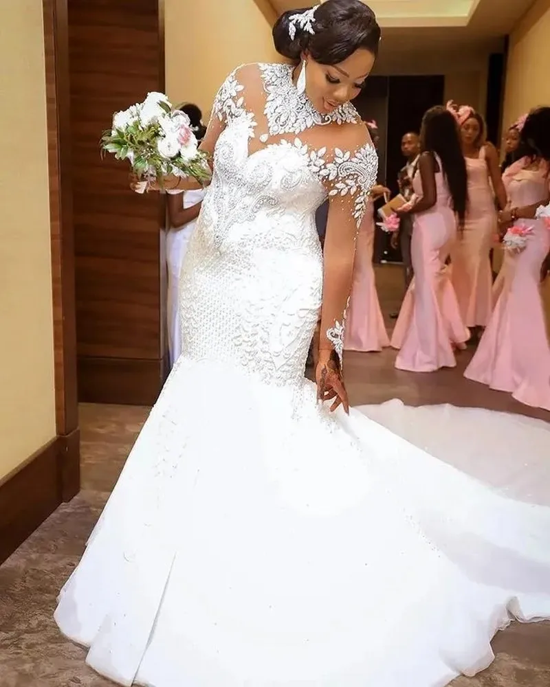 2024 Beaded Crystals Wedding Dress Sheer Neck Lace Long Sleeves Bridal Gwons Arabic Aso Ebi Vestidos De Novia
2024 Beaded Crystals Wedding Dress Sheer Neck Lace Long Sleeves Bridal Gwons Arabic Aso Ebi Vestidos De Novia