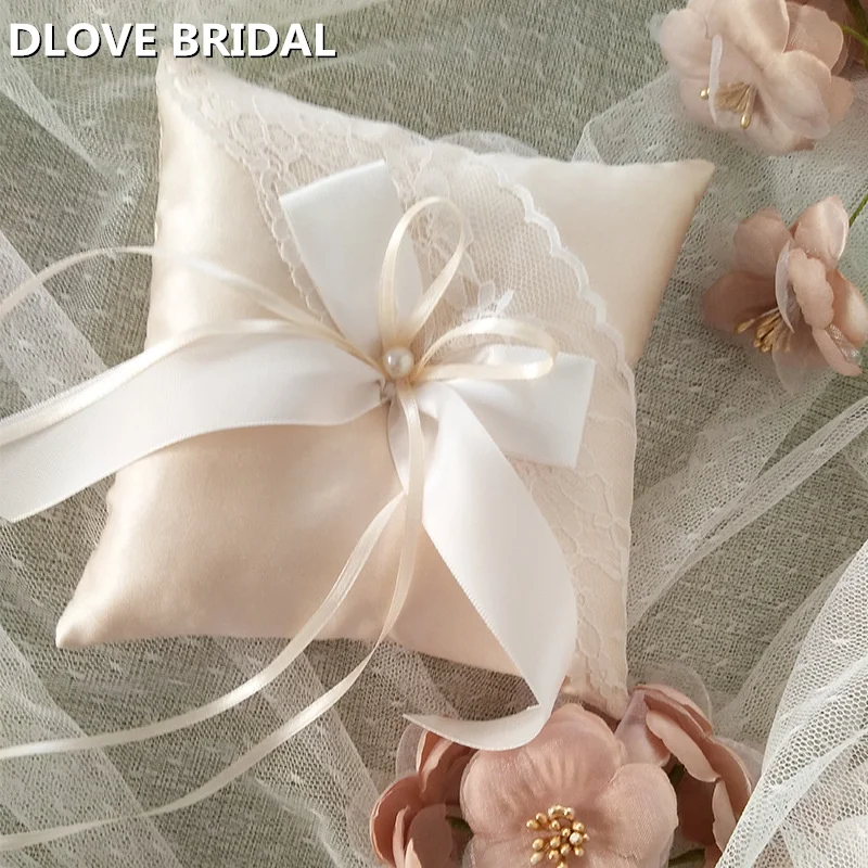 Lace Ribbon Ring Pillow Handmade Bridal Wedding Champagne Satin Cushion Decor for Wedding Ceremony
Lace Ribbon Ring Pillow Handmade Bridal Wedding Champagne Satin Cushion Decor for Wedding Ceremony