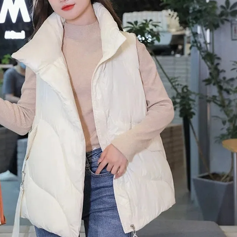 Down Cotton Quality Black Vest Coat Women's Autumn Winter Loose Lightweight Buckle Streamer Solid Sleeveless Jacket Waistcoat
Down Cotton Quality Black Vest Coat Women's Autumn Winter Loose Lightweight Buckle Streamer Solid Sleeveless Jacket Waistcoat