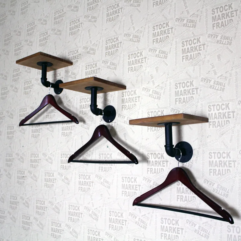 Iron art solid wood wall with board clothing display rack water pipe hanging on both sides
Iron art solid wood wall with board clothing display rack water pipe hanging on both sides