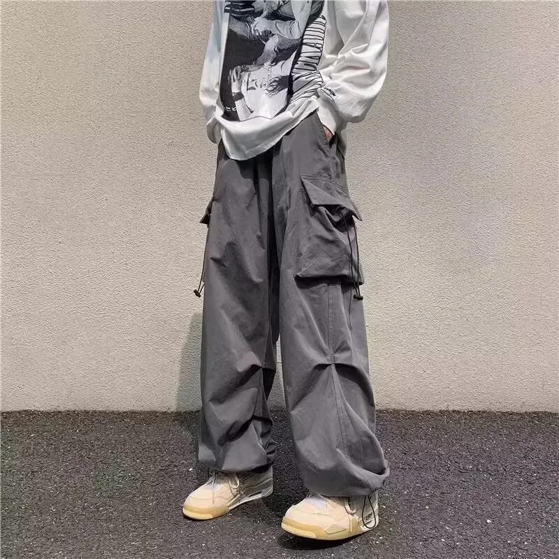 

Men Hiphop Street Overalls Oversized Pocket Trousers Harajuku Loose Solid Color Casual Pants Male Multi Baggy