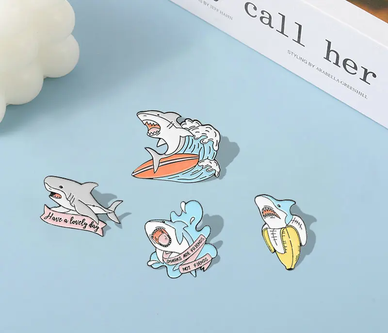 Shark are Friends Enamel Pin Custom Shark Week Banana Surfing Brooches Bag Lapel Pin Fun Animal Badge Cute Jewelry Gift for Kids
Shark are Friends Enamel Pin Custom Shark Week Banana Surfing Brooches Bag Lapel Pin Fun Animal Badge Cute Jewelry Gift for Kids
