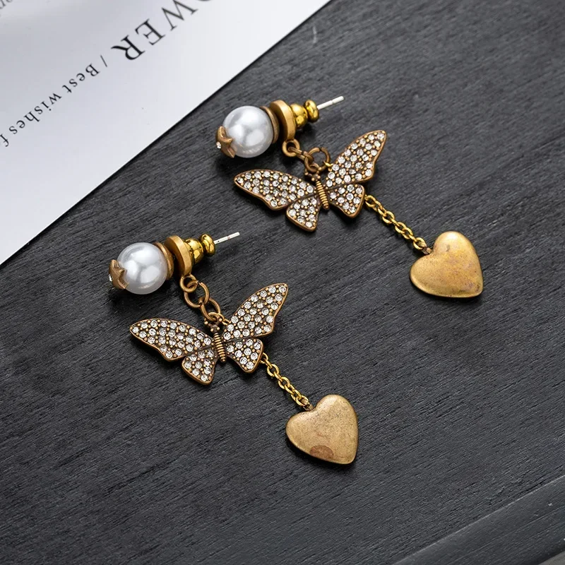 Light luxury vintage butterfly love heart imitation pearl earrings for women
Light luxury vintage butterfly love heart imitation pearl earrings for women