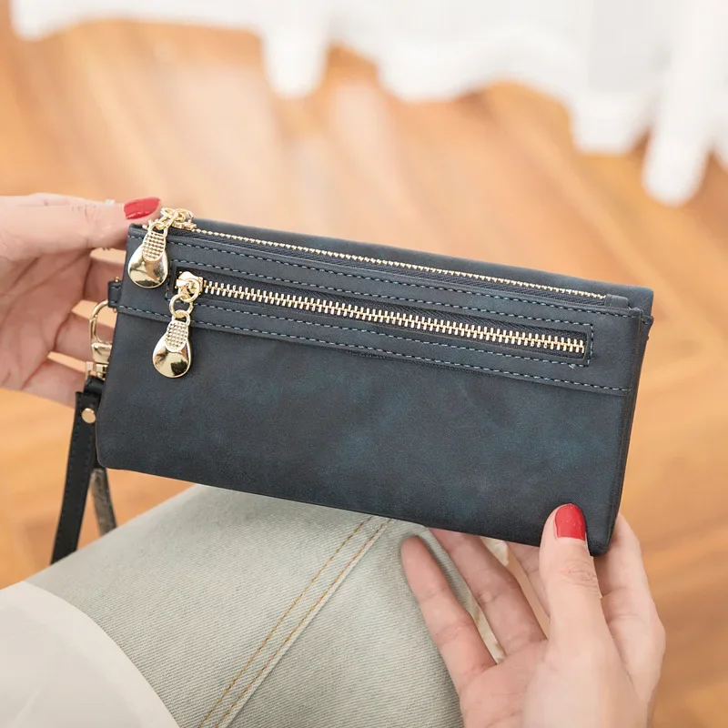 The New Fashion Trend Network Red Matching Solid Color Women's Purse Retro Multi-functional Long Large Capacity Clutch Bag
The New Fashion Trend Network Red Matching Solid Color Women's Purse Retro Multi-functional Long Large Capacity Clutch Bag