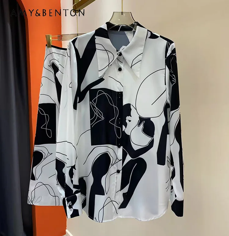 2023 Spring Summer New Black Floral Printing Lapel Long Sleeve Single-Breasted Shirt + Stitching High Waist Skirt Two Piece Set
2023 Spring Summer New Black Floral Printing Lapel Long Sleeve Single-Breasted Shirt + Stitching High Waist Skirt Two Piece Set